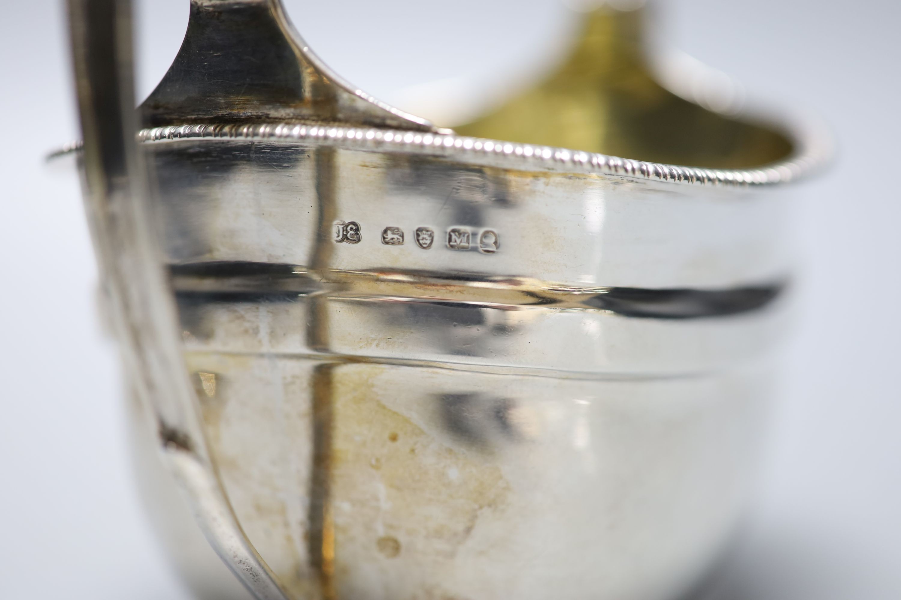 A George III silver two handled sugar bowl, John Emes, London, 1807, height 11.2cm, together with a later silver cigarette case, gross 11oz.